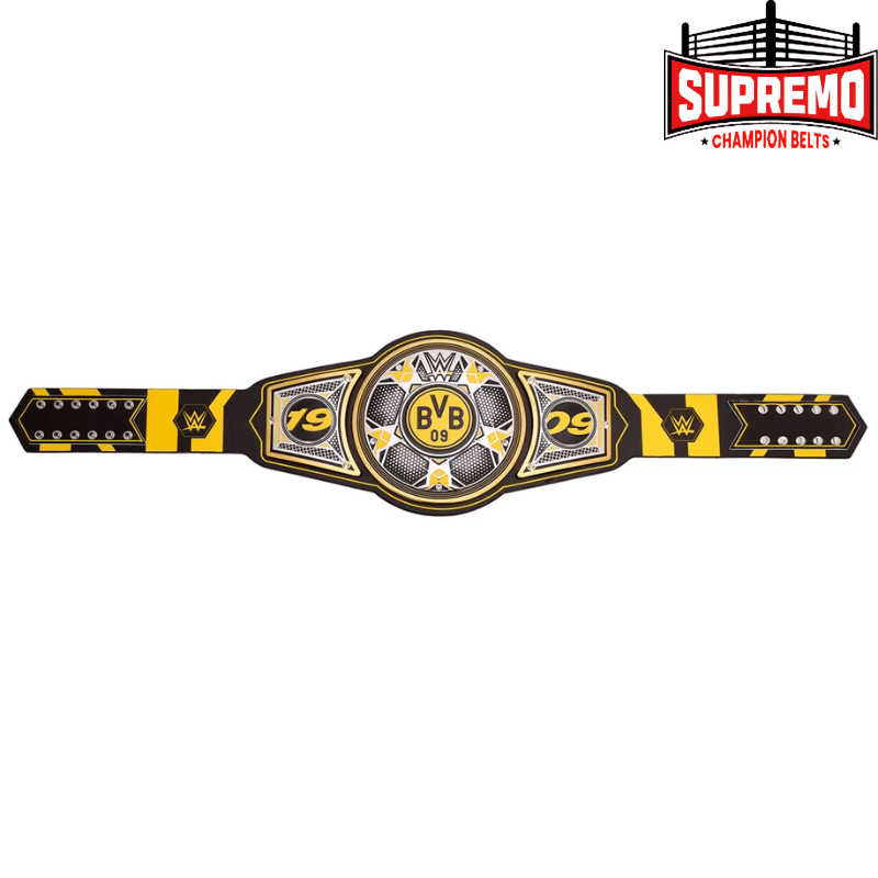 Full-size WWE x Borussia Dortmund replica belt laid flat on a table